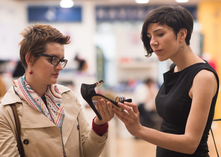 Women with short hair buying high heels