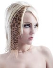 Platinum blonde hair with a leopard pattern hair piece